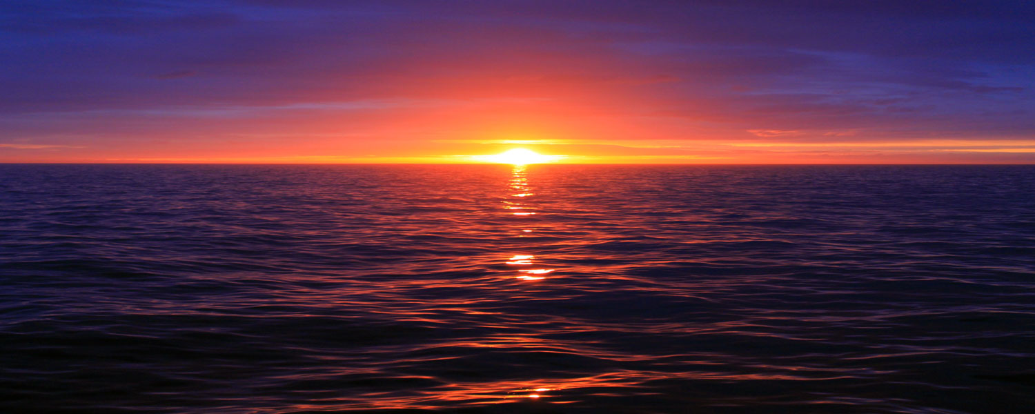 sunset over the North Pacific. Image courtesy of NOAA, Unsplash