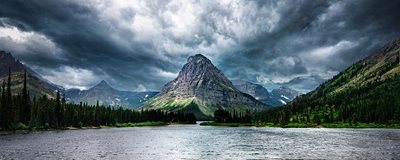 Lake with mountain in background and stormy skies. Courtesy Jordan Lomibao on Unsplash