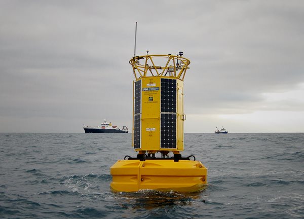 Yellow E1 data buoy at sea