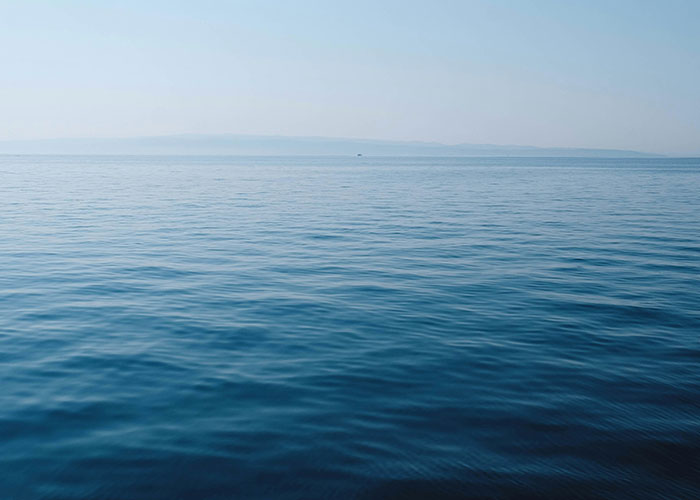 Vast ocean surface and horizon