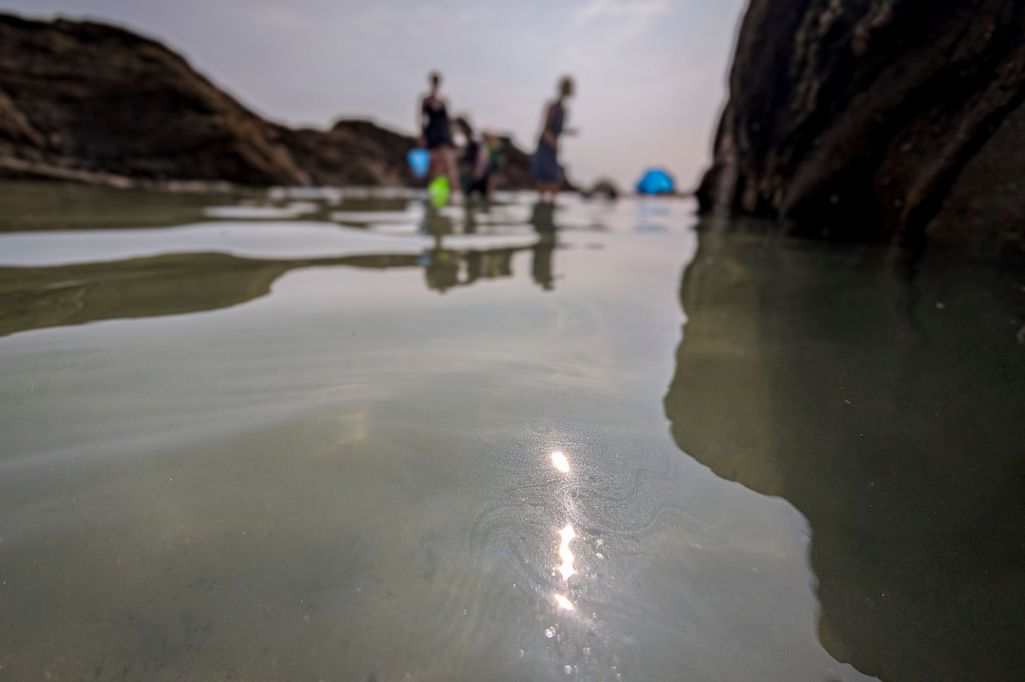 Sunscreen washed into a rockpool