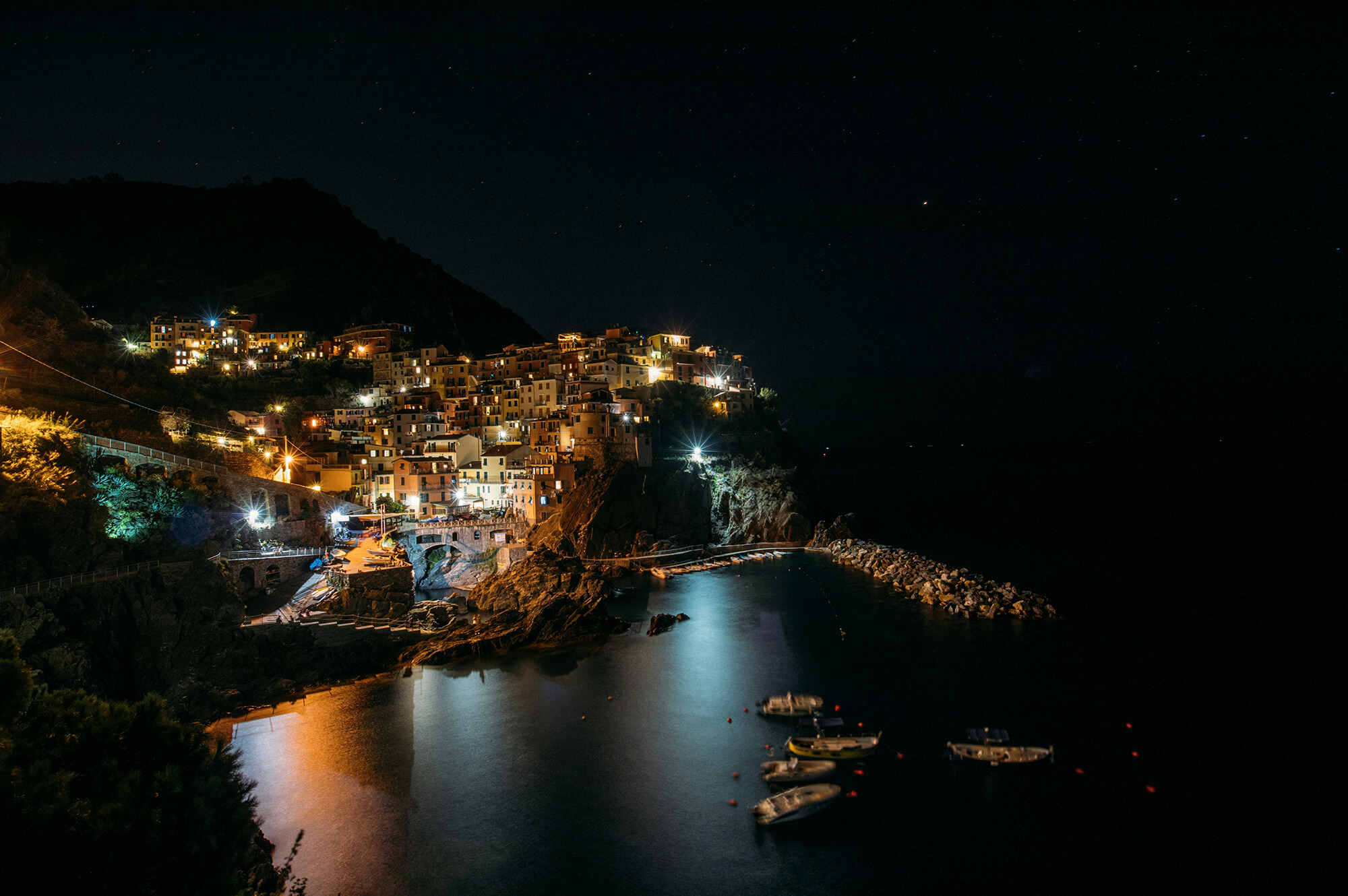 Italian coastline at night. Rafael Peier | Unsplash